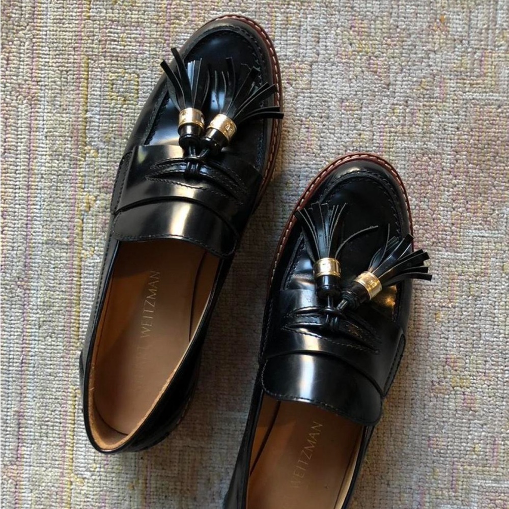 Stuart Weitzman Black Leather Tassel Penny Loafers with Gold Accents